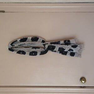 Handcrafted black and cream silk scarf with soft texture and fringe detail